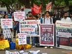 Protest at Jantar Mantar organised by a human rights advocacy group – Campaign for the Release of Workers and Activists of Noida (CaRWAN) – on Saturday. (Sanchit Khanna/ HT Photo)