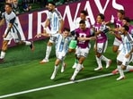 Argentina's Julian Alvarez celebrates scoring their second goal with teammates 