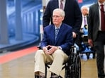 Mitch McConnell (R-KY) is pushed in a wheelchair through the Senate Subway during the Senate War Powers vote on April 22.