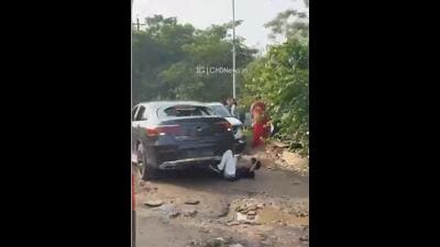 According to the police, the driver, while trying to flee, immediately reversed the vehicle in an apparent attempt to move it aside, during which he hit the victim. (HT Photo) According to the police, the driver, while trying to flee, immediately reversed the vehicle in an apparent attempt to move it aside, during which he hit the victim. (HT Photo)