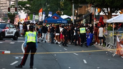 Police respond to an active shooter at the Salsa on St. Clair event in Toronto. (AP) Police respond to an active shooter at the Salsa on St. Clair event in Toronto. (AP)
