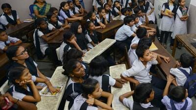 Mumbai, India – 16 Feb. 2018: Dharavi Kala Killa BMC School children and 20,000 students from BMC Schools in Mumbai listening to Prime Minister Shri Narendra Modi on various issues including fear of exams and motivating them to treat this as a Festival of Exams from Talkatora Stadium, was telecast to Digital Virtual Classrooms in BMC school , in Mumbai, India, on Friday, Feb 16, 2018. (Photo by Bhushan Koyande/HT) Mumbai, India – 16 Feb. 2018: Dharavi Kala Killa BMC School children and 20,000 students from BMC Schools in Mumbai listening to Prime Minister Shri Narendra Modi on various issues including fear of exams and motivating them to treat this as a Festival of Exams from Talkatora Stadium, was telecast to Digital Virtual Classrooms in BMC school , in Mumbai, India, on Friday, Feb 16, 2018. (Photo by Bhushan Koyande/HT)