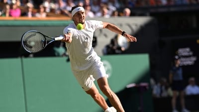 It was a tight contest as the German won in the tie-breaker, clinching it 7(9)-6(7). (AFP) It was a tight contest as the German won in the tie-breaker, clinching it 7(9)-6(7). (AFP)