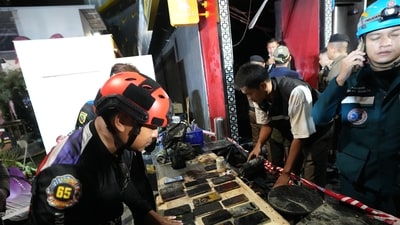 Mobile phones of victims of a fire are recovered in Bangkok, Thailand, Monday, July 13, 2026. (AP Photo/Sakchai Lalit) Mobile phones of victims of a fire are recovered in Bangkok, Thailand, Monday, July 13, 2026. (AP Photo/Sakchai Lalit)