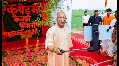 Uttar Pradesh chief minister Yogi Adityanath during the plantation drive in Gorakhpur on Sunday. (ANI PHOTO) Uttar Pradesh chief minister Yogi Adityanath during the plantation drive in Gorakhpur on Sunday. (ANI PHOTO)