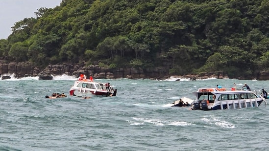 Rescue personnel carry out operations after a speedboat carrying Indian tourists capsized near Hon May Rut Ngoai off Phu Quoc Island, Vietnam, on Saturday. Fifteen Indian tourists were killed and 16 others rescued in the accident.