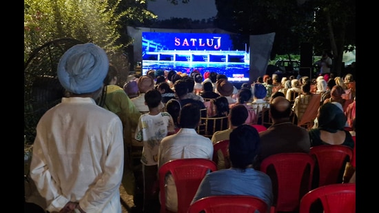 People attend a screening of the banned movie ‘Satluj’ in Amritsar on Sunday. (ANI Photo)