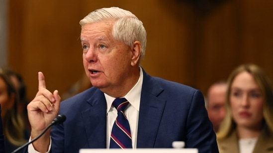Lindsey Graham's final moments: Photos show the senator being wheeled out on a gurney as EMS fought to save him