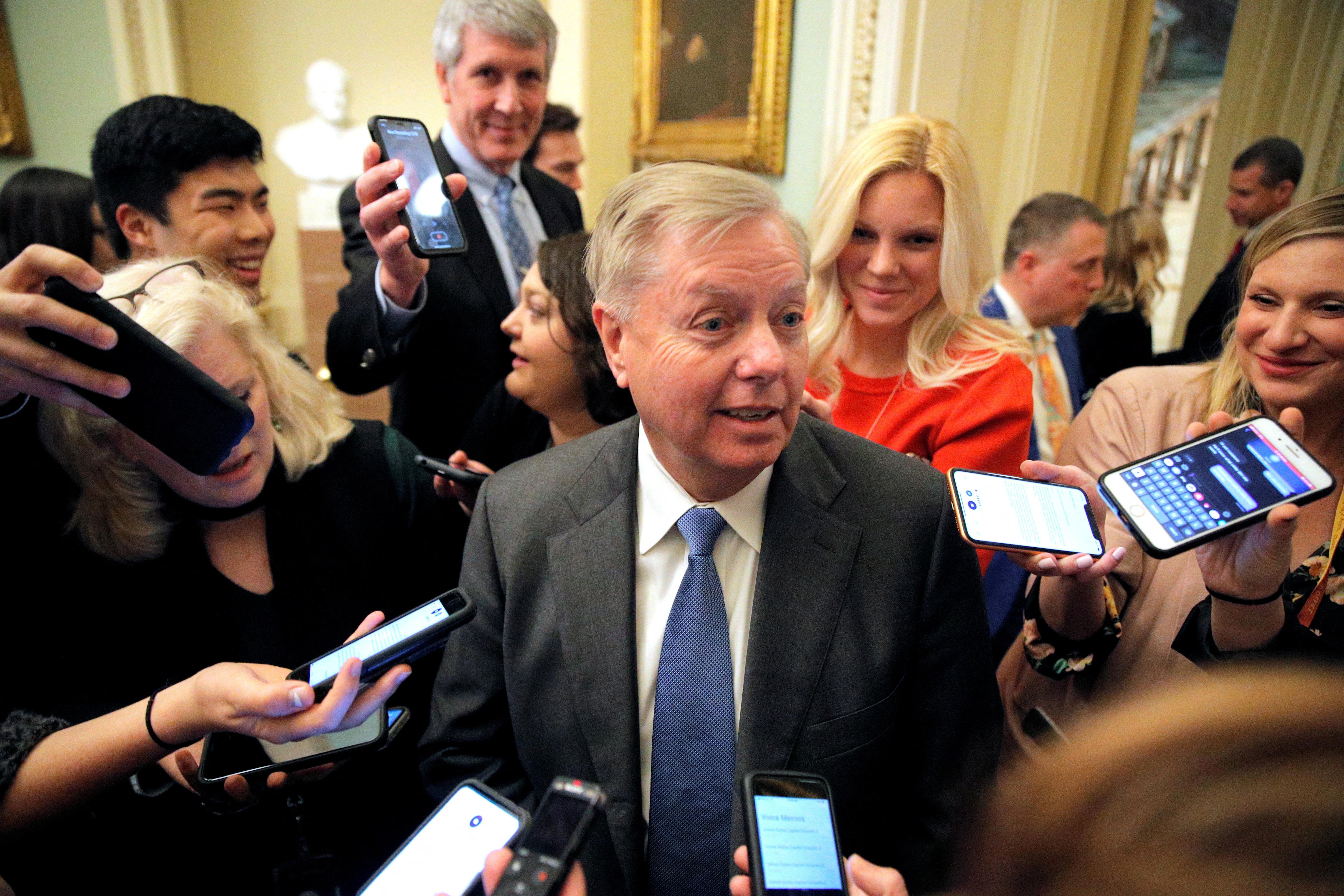 US Senator Lindsey Graham (R-SC) speaks to members of the media prior to the resumption of the Senate impeachment trial of President Donald Trump at the U.S. Capitol in Washington, January 31, 2020. (REUTERS)