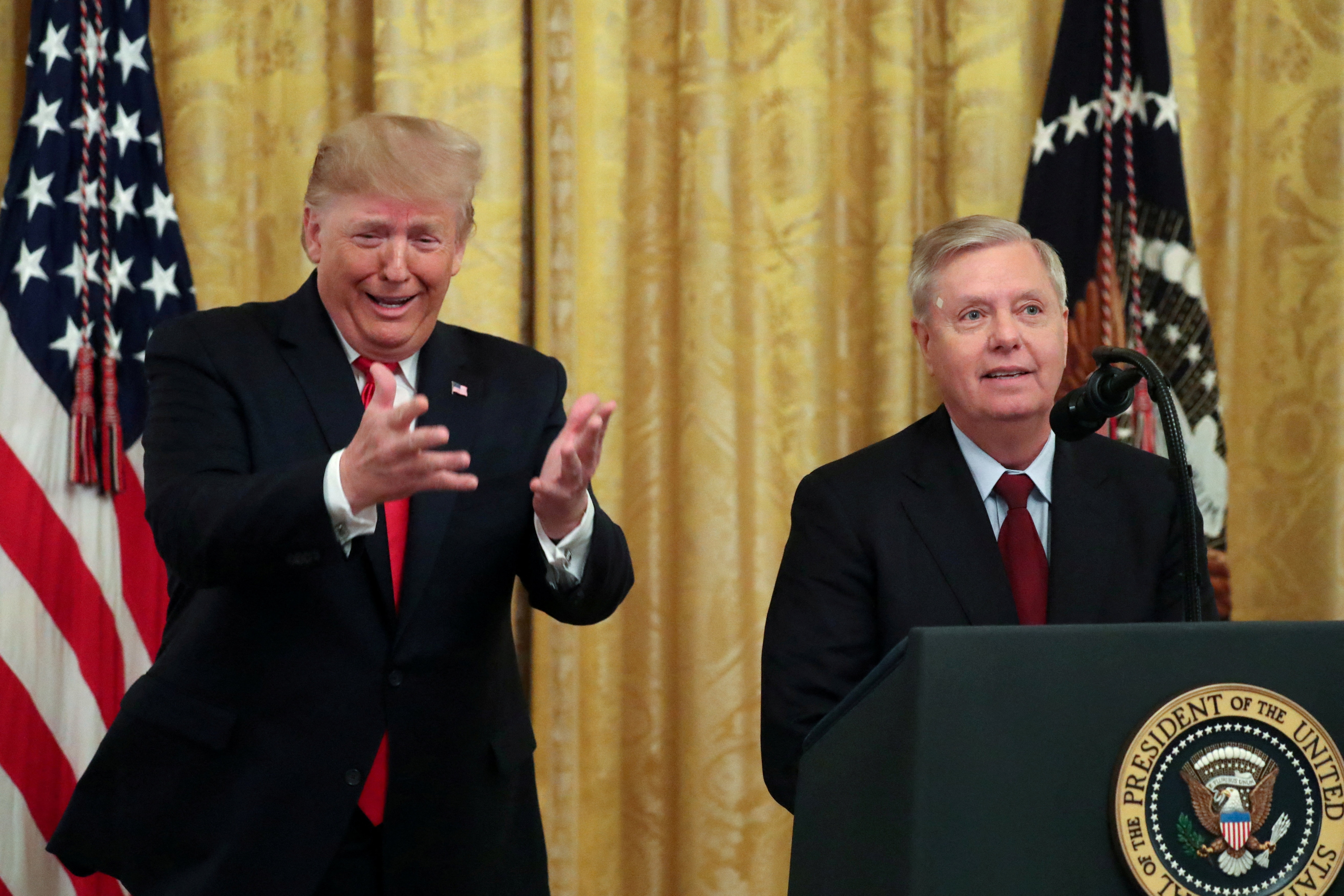US President Donald Trump with Senator Lindsey Graham in the East Room of the White House in Washington, US November 6, 2019. (REUTERS)