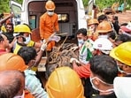 People carry the mortal remains of Vikram Rana, 58, a construction manager from Himachal Pradesh, recovered during a search operation following the landslide on Tuesday at the tunnel project site in Kalladi, Wayanad. (PTI) People carry the mortal remains of Vikram Rana, 58, a construction manager from Himachal Pradesh, recovered during a search operation following the landslide on Tuesday at the tunnel project site in Kalladi, Wayanad. (PTI)