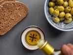 Read more to find out how switching to olive oil influences heart disease risk!(Unsplash)