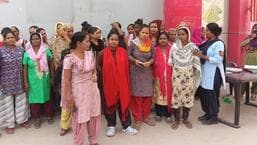 Domestic workers protest over stray dog bites at Greater Noida society Domestic workers protest over stray dog bites at Greater Noida society