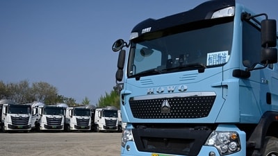 Despite years of pilots, subsidies, and industry pledges, fewer than 1,000 electric heavy-duty trucks operate on Indian roads, out of a fleet of nearly 4 million in India. (AFP/Representational Photo) Despite years of pilots, subsidies, and industry pledges, fewer than 1,000 electric heavy-duty trucks operate on Indian roads, out of a fleet of nearly 4 million in India. (AFP/Representational Photo)