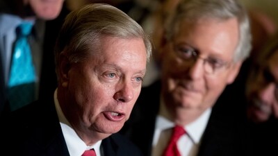 Sen. Lindsey Graham, R-S.C., accompanied by Senate Majority Leader Mitch McConnell, R-Ky., (R), speaks to reporters at the Capitol in Washington on September 26, 2017. (AP Photo/Andrew Harnik, File) (AP Photo/Andrew Harnik)