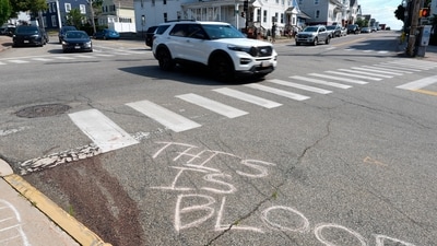 Blood is seen on the pavement near the scene of a shooting involving U.S. Immigration and Customs Enforcement, Monday, July 13, 2026 in Biddeford, Maine. Blood is seen on the pavement near the scene of a shooting involving U.S. Immigration and Customs Enforcement, Monday, July 13, 2026 in Biddeford, Maine.
