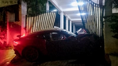 A Ferrari sports car rammed into the front gate of a Hill View apartment in Hyderabad's Film Nagar; a probe is currently underway (PTI) A Ferrari sports car rammed into the front gate of a Hill View apartment in Hyderabad's Film Nagar; a probe is currently underway (PTI)