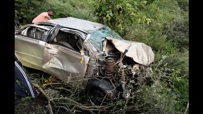 The mangled remains of the car after mishap in Himachal Pradesh’s Sirmaur, on Monday. (HT Photo)