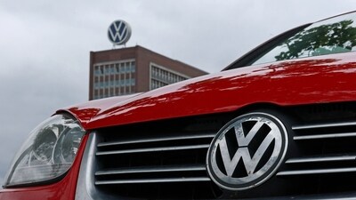 A Volkswagen car parks in front of the Volkswagen headquarters on the day of the supervisory board meeting, in Wolfsburg, Germany. (REUTERS)