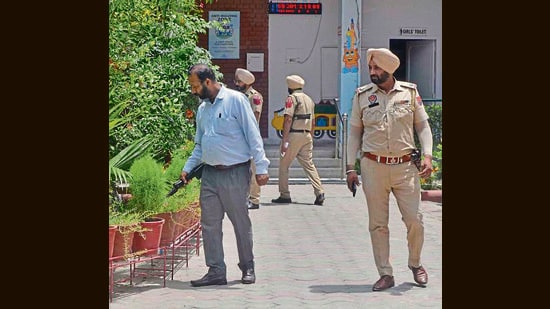 Police conducting checks at a private school in Ludhiana on Monday. (Gurpreet Singh/HT)