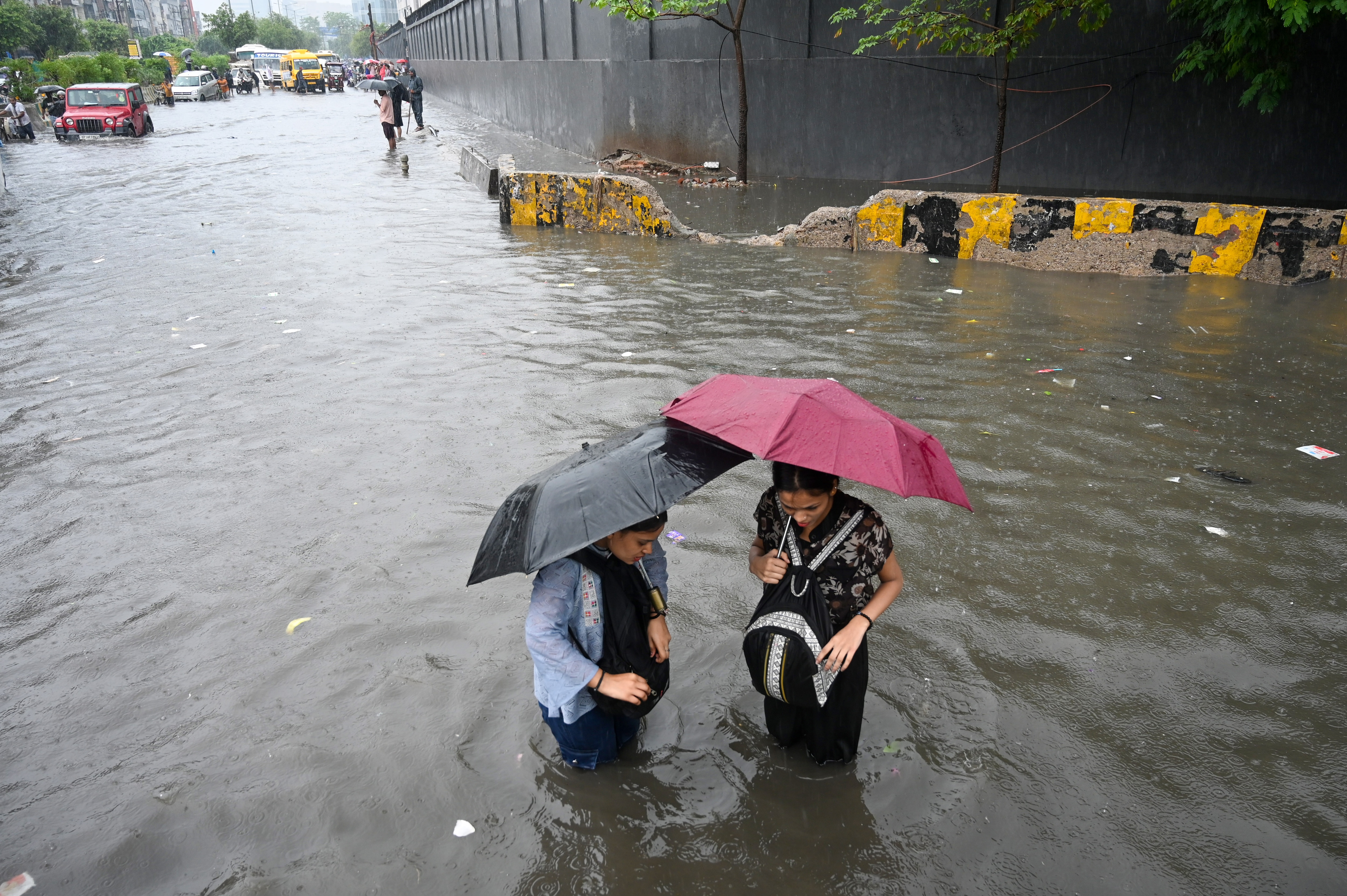 Waddling through waterlogged areas presents its own health risks. (Photo by Sunil Ghosh / Hindustan Times) Waddling through waterlogged areas presents its own health risks. (Photo by Sunil Ghosh / Hindustan Times)