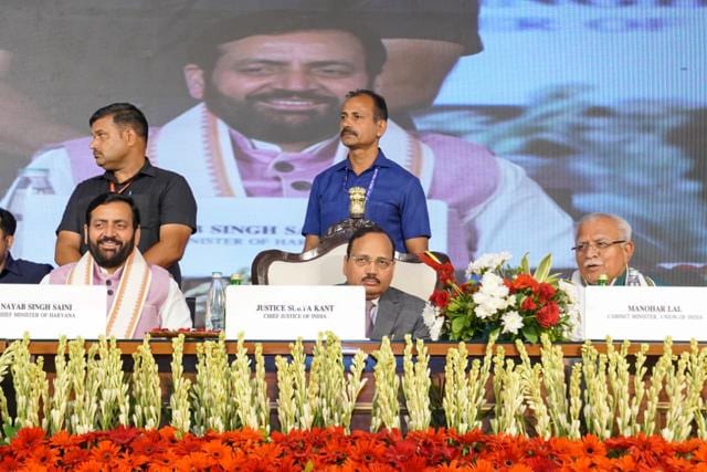 (From left) Haryana chief minister Nayab Singh Saini; CJI Surya Kant; Union minister Manohar Lal. (Parveen Kumar/HT) (From left) Haryana chief minister Nayab Singh Saini; CJI Surya Kant; Union minister Manohar Lal. (Parveen Kumar/HT)