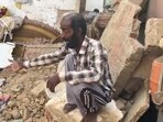 Dharam Singh, the head of the family, sitting amid the rubble of his house after the roof collapsed in Talwandi Sabo on Monday night. (HT Photo)