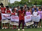 Footballers, coaches and sports enthusiasts have protested against the proposal to convert the Neville D’Souza Football Ground into a convention centre. (Anshuman Poyrekar/HT Photo)