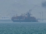 This screengrab from a video shows a cargo ship anchoring near the Strait of Hormuz off the eastern coast of the UAE. Tehran announced it was closing the Strait of Hormuz on July 12, in retaliation for new US strikes.