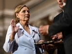 Darline Graham Nordone, sister of Lindsey Graham, is ceremonially sworn in as a US Senator by Senator Charles Grassley, Republican from Iowa, (out of frame) in the Old Senate Chamber at the US Capitol in Washington, DC.