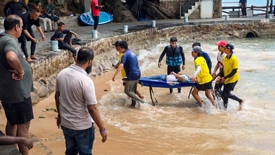 Rescue personnel conduct operations after a speedboat carrying Indian tourists capsized near Hon My Rout Ngoi off Phu Quoc Island, Vietnam, on Saturday.