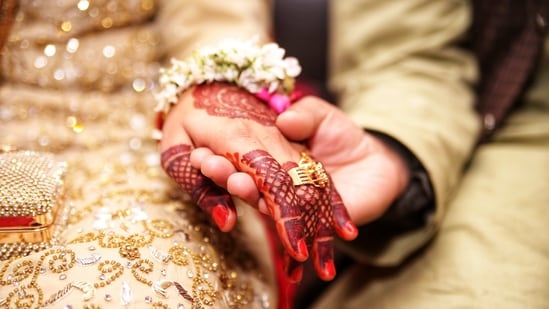 An Indian woman seeking a husband who earns <span class='webrupee'>₹</span>1 crore or more has sparked a debate online. (Unsplash/@kography)