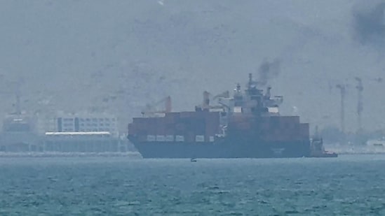 This screengrab from a video shows a cargo ship anchoring near the Strait of Hormuz off the eastern coast of the UAE. Tehran announced it was closing the Strait of Hormuz on July 12, in retaliation for new US strikes.