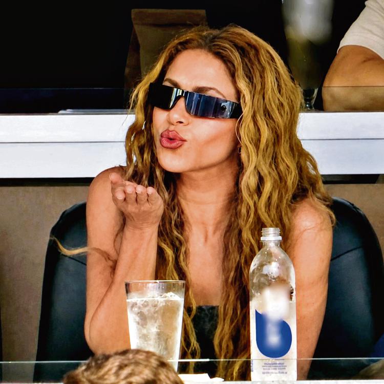 Famous fan: Shakira was spotted in the stands with her children during the tournament.