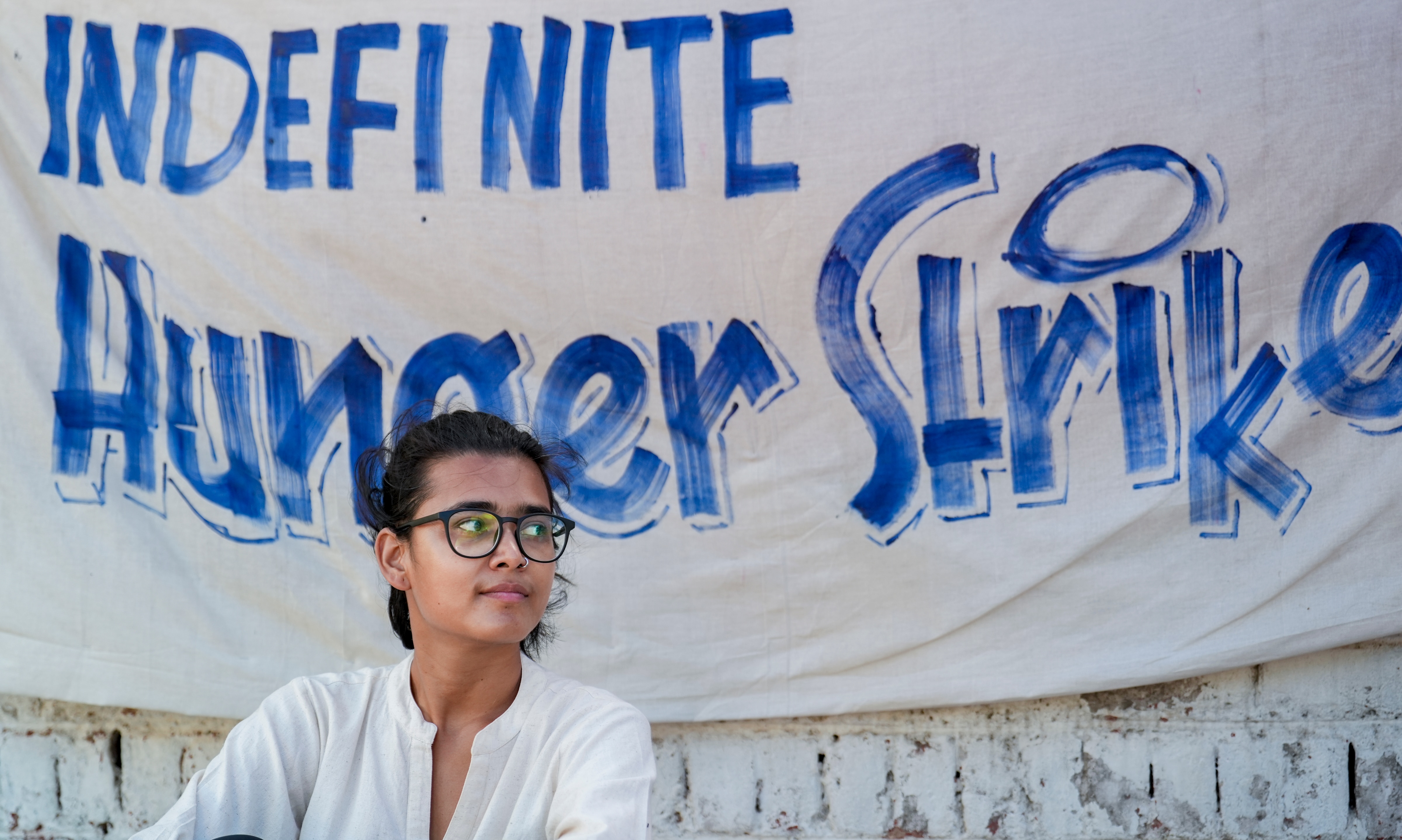 Activist Neha Bora of AISA during a hunger strike at CJP protest site. (Karma Bhutia/PTI Photo) Activist Neha Bora of AISA during a hunger strike at CJP protest site. (Karma Bhutia/PTI Photo)