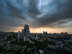 Gram it: A dramatic view of dark monsoon clouds looming over the skyline before rain in Sector 67, Gurugram, on Tuesday night. While IMD has forecast partly cloudy sky for today, brace yourselves for hot and humid conditions simultaneously. The maximum temperatures are likely to range between 37°C to 39°C.