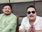 Madan Mitra with Trinamool Congress (TMC) rebel faction leader Ritabrata Banerjee after saying he had resigned from posts in the TMC led by Mamata Banerjee.(ANI Video Grab)
