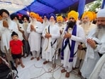Akal Takht acting jathedar Giani Kuldeep Singh Gargaj leading a special prayer ceremony at Harike in Tarn Taran on Tuesday. (PTI)