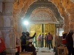 Ayodhya, Jan 15 (ANI): A view of the 'golden door' Is being installed at the Ram temple in Ayodhya on Monday. This door is about 12 feet high and 8 feet wide. 13 more doors will be installed in the coming 3 days. These doors are being installed on the upper floor of the sanctum sanctorum. A total of 46 doors will be installed in the Ram temple, out of which 42 will be coated with 100 kg gold. (ANI Photo) (Ram Janmbhoomi Teerth Kshetra Tr)