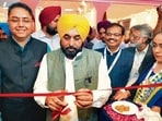 CM Bhagwant Mann with minister Aman Arora inaugurating the Punjab State Pavilion at BharatTex 2026 in New Delhi. (Sourced)