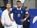 Kylian Mbappe looks on after France's defeat to Spain. Kylian Mbappe looks on after France's defeat to Spain.