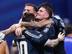 Lionel Messi and his Argentine teammates celebrated the big win over England after a hard-fought match.