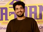 Samay Raina poses for photographs during a live concert.
