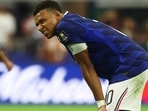 France's Kylian Mbappe looks dejected after the match.