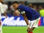 France's Kylian Mbappe looks dejected after the match 