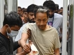 Activist Sonam Wangchuk is assisted by volunteers during his daily morning routine as he continues his indefinite hunger strike for the 18th consecutive day at Jantar Mantar in New Delhi on Wednesday, July 15, 2026. The protest, held in solidarity with the Cockroach Janta Party (CJP), demands resignation of Union education minister Dharmendra Pradhan over exam-related irregularities and paper leaks.(Vipin Kumar/HT Photo)