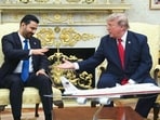 US President Donald Trump shakes hands with Iraqi Prime Minister Ali al-Zaidi during a meeting at the White House.