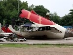 Wreckage of the Air India Boeing 787-8 Dreamliner plane sits on the open ground, outside Sardar Vallabhbhai Patel International Airport, where it took off and crashed nearby shortly afterwards, in Ahmedabad.