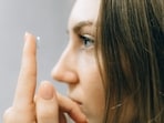 Read more to find out why sleeping with contact lenses on can be harmful.