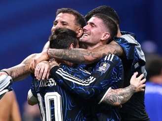 Lionel Messi and his Argentine teammates celebrated the big win over England after a hard-fought match.